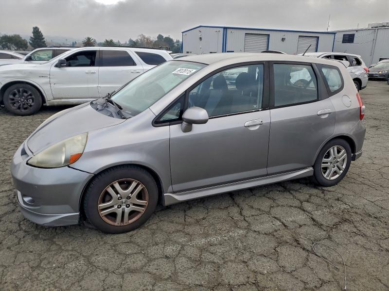 HONDA FIT S 2007 with VIN JHMGD38657S028516 - Photo from auction