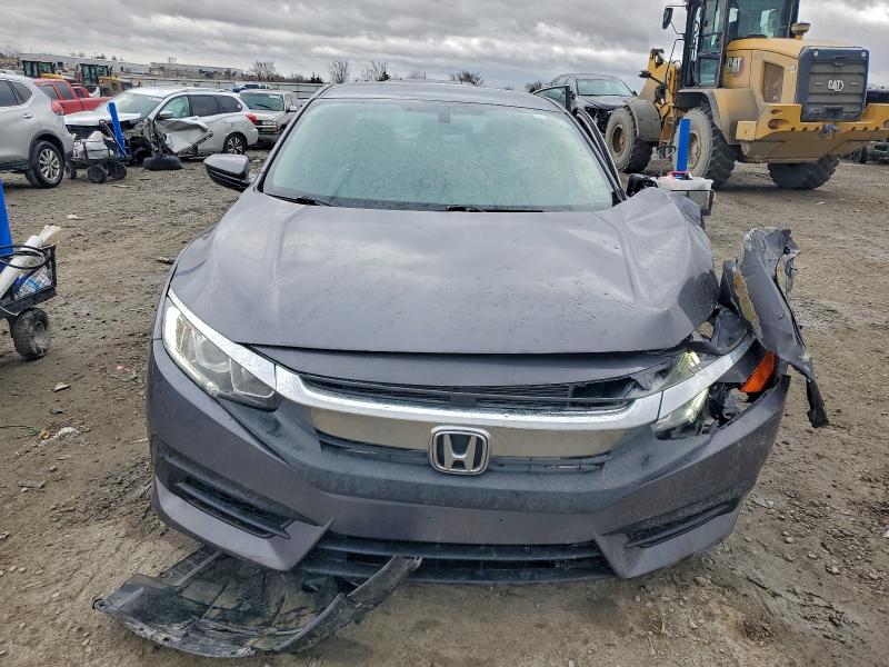 Photo 5 from auction – 2017 HONDA CIVIC LX with VIN 2HGFC2F50HH545155