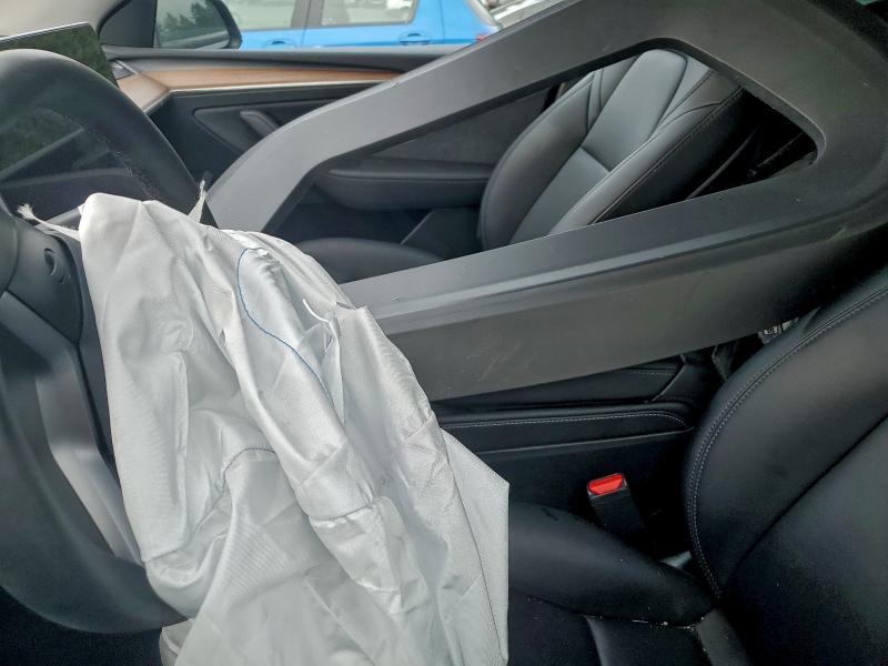 Photo 7 from auction – 2023 TESLA MODEL Y with VIN 7SAYGDEE8PF585712
