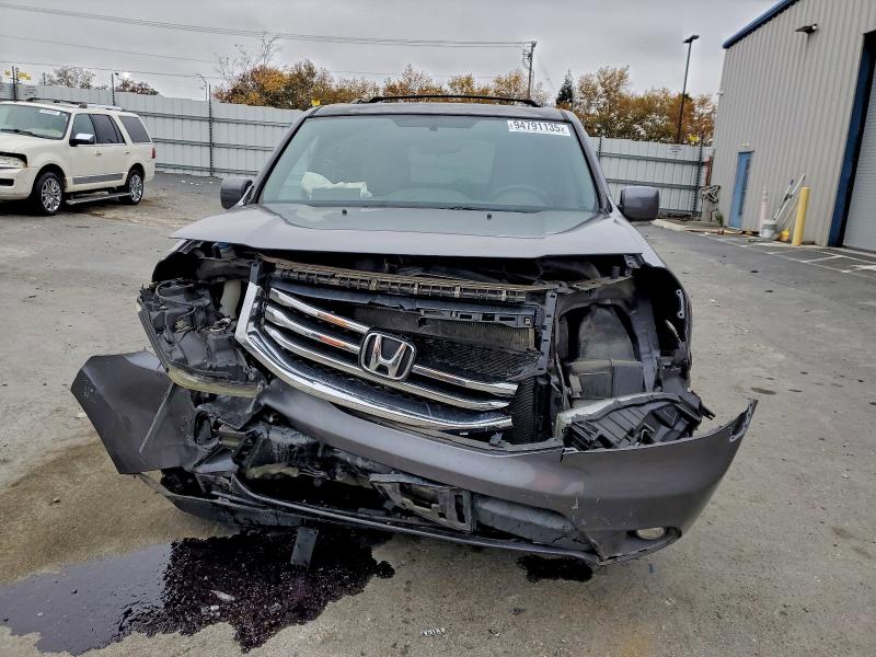 Photo 5 from auction – 2015 HONDA PILOT EX with VIN 5FNYF4H47FB003679