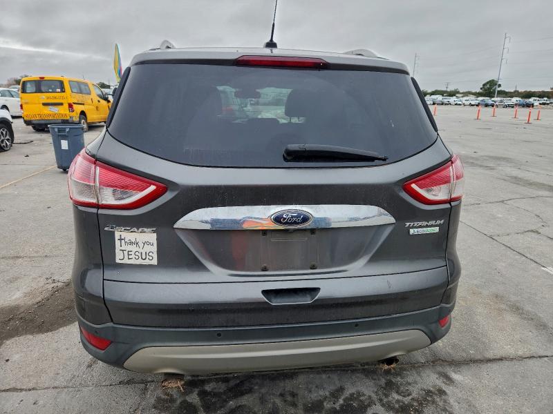 Photo 6 from auction – 2016 FORD ESCAPE TIT with VIN 1FMCU0JX5GUA04069