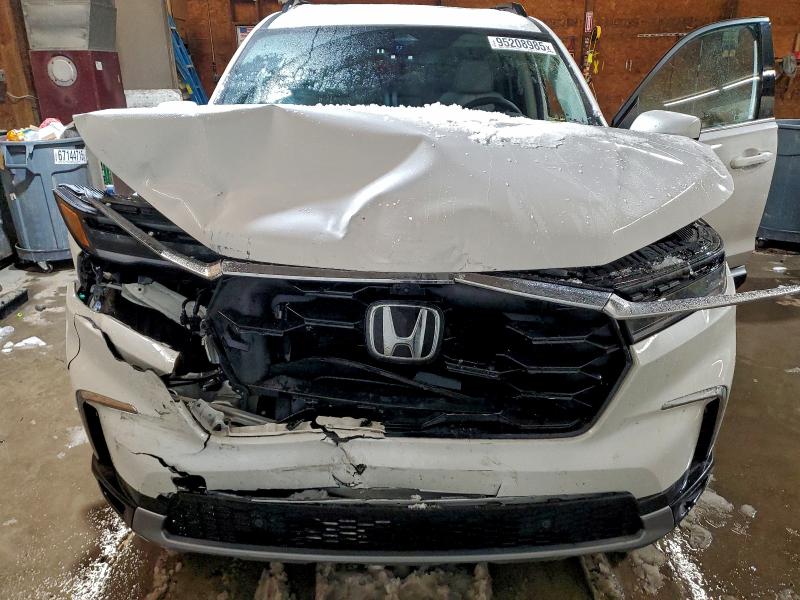 Photo 12 from auction – 2025 HONDA PILOT ELIT with VIN 5FNYG1H82SB125617