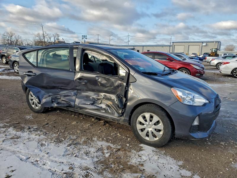 Photo 4 from auction – 2014 TOYOTA PRIUS C with VIN JTDKDTB31E1571486