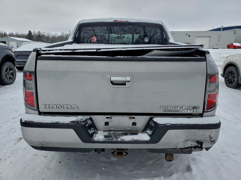 Photo 6 from auction – 2014 HONDA RIDGELINE with VIN 5FPYK1F55EB501150
