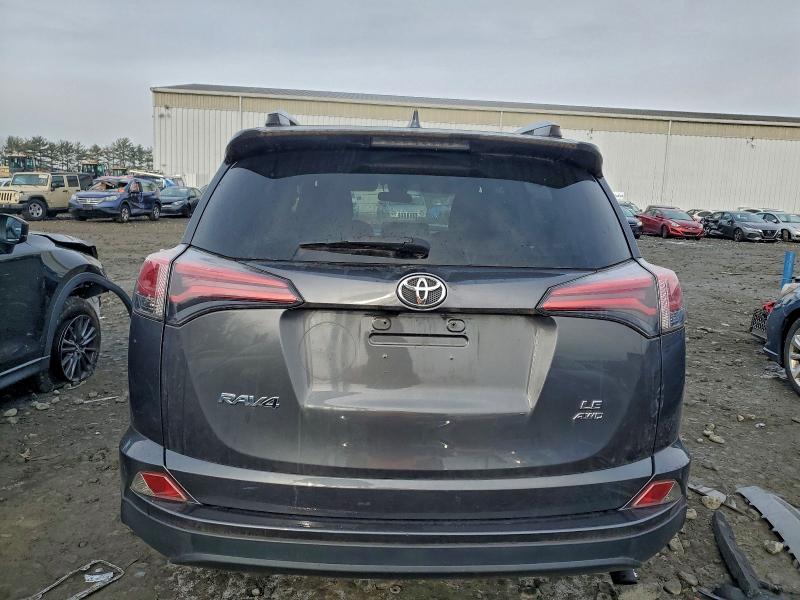 Photo 6 from auction – 2018 TOYOTA RAV4 LE with VIN JTMBFREV1JJ200770
