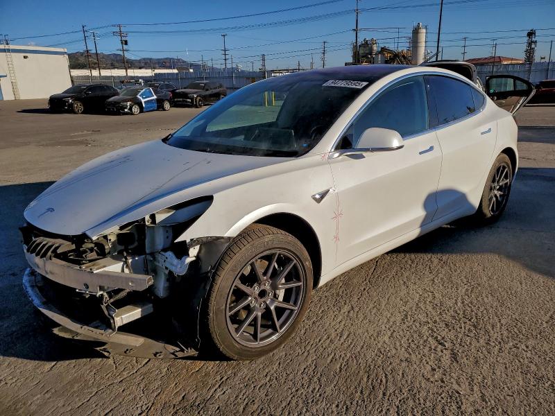 TESLA MODEL 3 2017 with VIN 5YJ3E1EA9HF001568 - Photo from auction