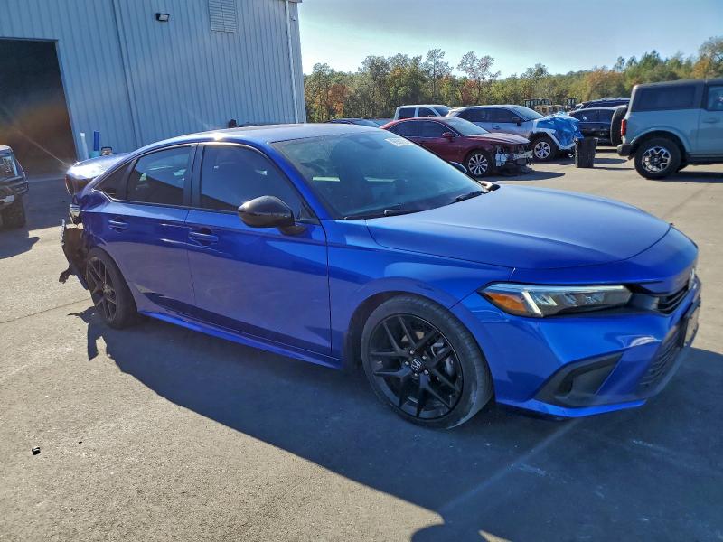 Photo 4 from auction – 2023 HONDA CIVIC SPOR with VIN 2HGFE2F52PH511145