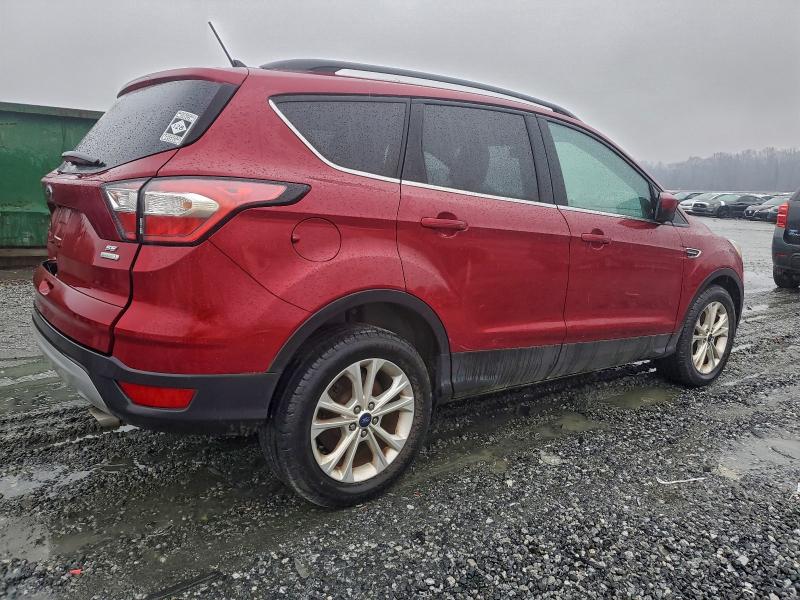 Photo 3 from auction – 2018 FORD ESCAPE SE with VIN 1FMCU0GD4JUA47953