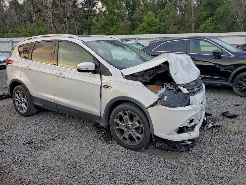 Photo 4 from auction – 2015 FORD ESCAPE TIT with VIN 1FMCU0J95FUA68984