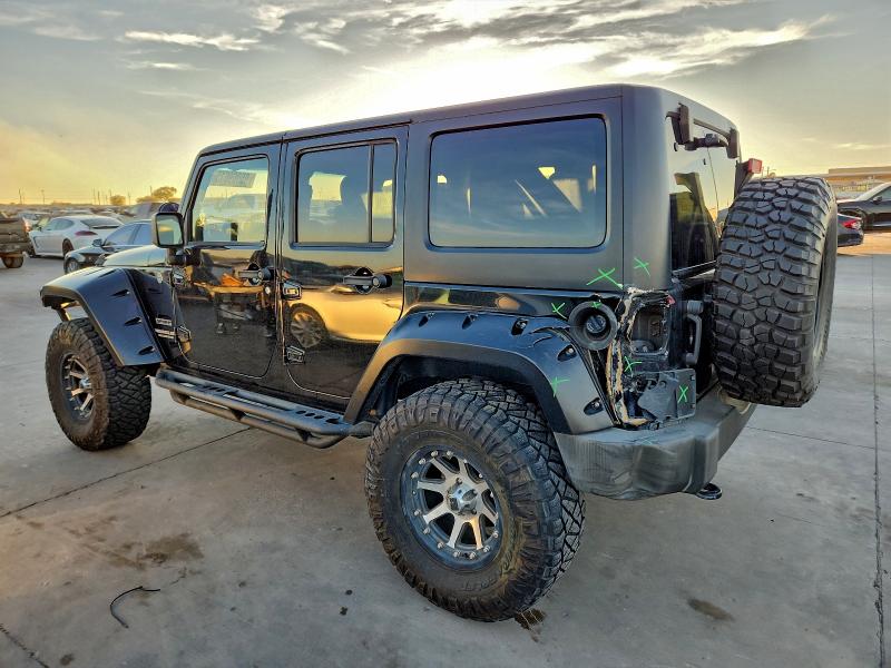 Photo 2 from auction – 2011 JEEP WRANGLER U with VIN 1J4BA3H10BL548614
