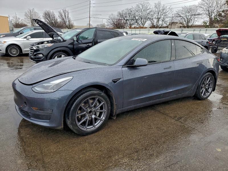 TESLA MODEL 3 2022 with VIN 5YJ3E1EA8NF320665 - Photo from auction