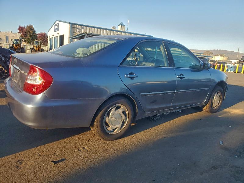 Photo 3 from auction – 2002 TOYOTA CAMRY with VIN JTDBE32K120083046