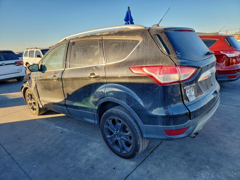Photo 2 from auction – 2014 FORD ESCAPE TIT with VIN 1FMCU9J92EUB82184