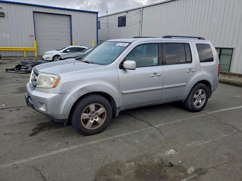 HONDA PILOT 2011 with VIN 5FNYF4H43BB075201 - Photo from auction