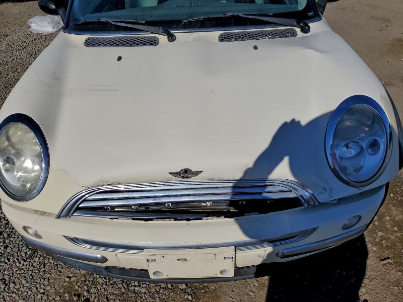 Photo 11 from auction – 2003 MINI COOPER with VIN WMWRC33473TE18119