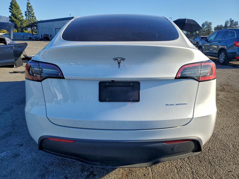 Photo 6 from auction – 2023 TESLA MODEL Y with VIN 7SAYGDEE3PA032060