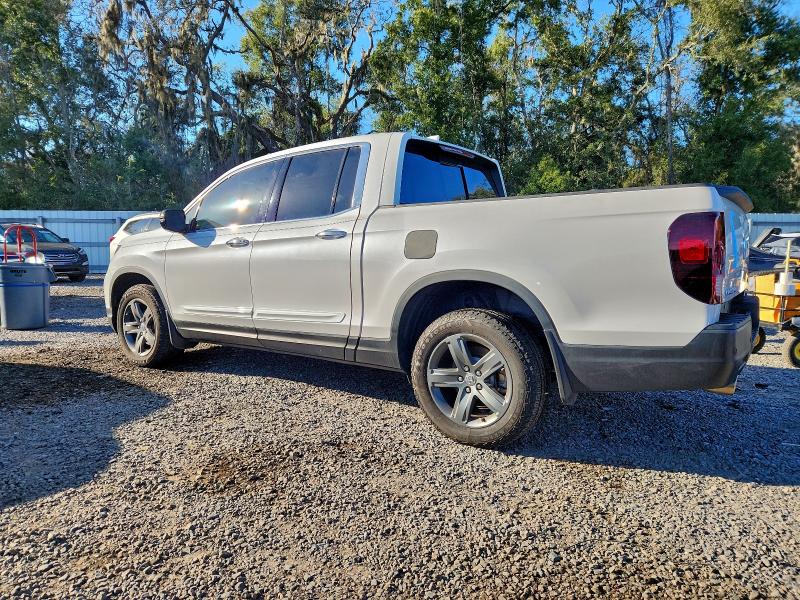 Photo 2 from auction – 2023 HONDA RIDGELINE with VIN 5FPYK3F76PB027810