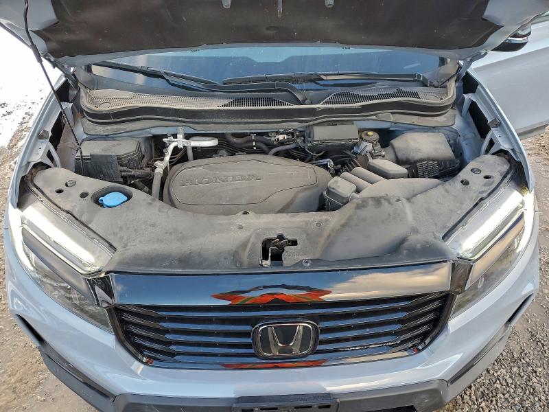 Photo 11 from auction – 2022 HONDA RIDGELINE with VIN 5FPYK3F80NB503443