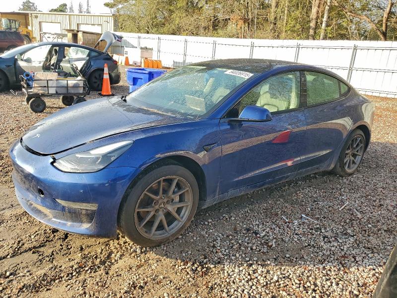 TESLA MODEL 3 2021 with VIN 5YJ3E1EA1MF090014 - Photo from auction