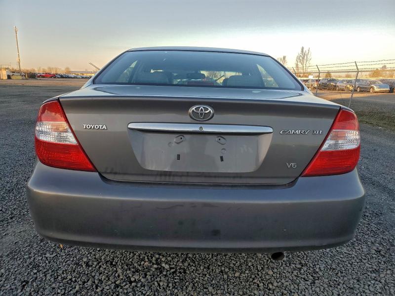 Photo 6 from auction – 2003 TOYOTA CAMRY LE with VIN 4T1BF30K53U555674
