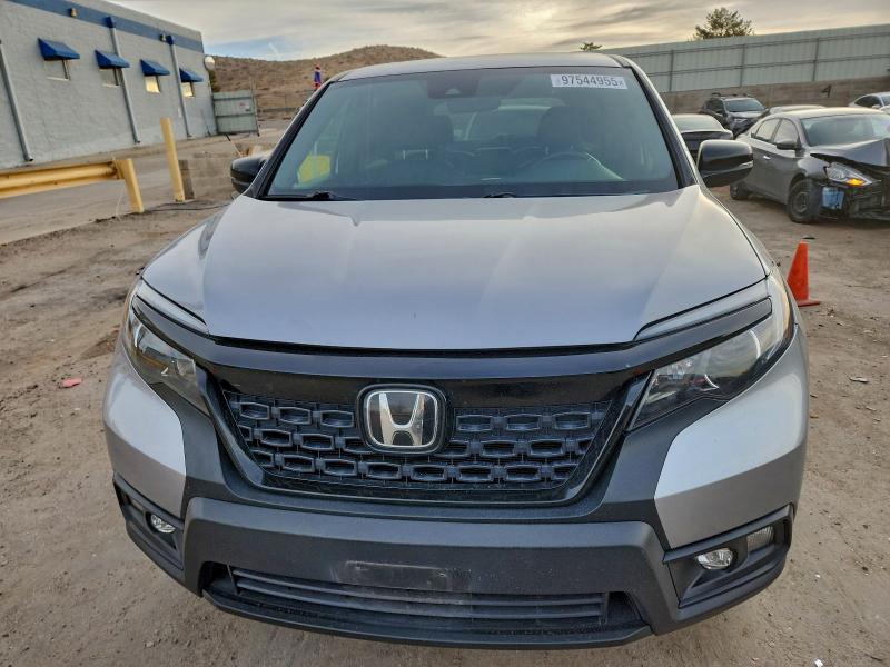 Photo 5 from auction – 2019 HONDA PASSPORT E with VIN 5FNYF8H53KB006203