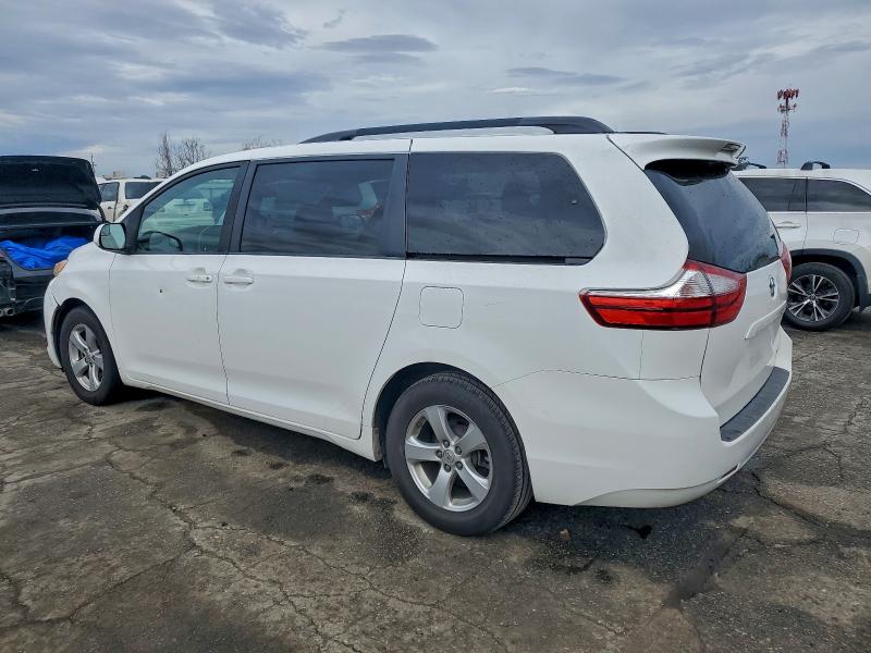 Photo 2 from auction – 2017 TOYOTA SIENNA LE with VIN 5TDKZ3DC3HS842151