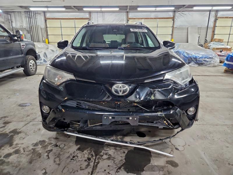 Photo 5 from auction – 2016 TOYOTA RAV4 XLE with VIN 2T3WFREV0GW287735