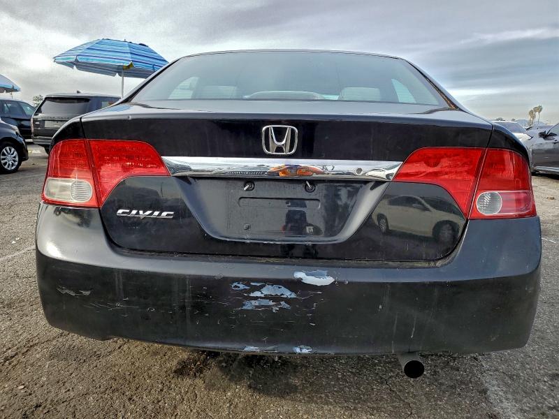 Photo 6 from auction – 2010 HONDA CIVIC with VIN 19XFA1F56AE045727
