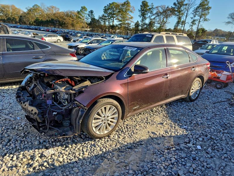 TOYOTA AVALON HYB 2014 with VIN 4T1BD1EB7EU027348 - Photo from auction