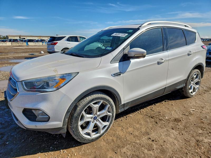 FORD ESCAPE 2018 with VIN 1FMCU0J99JUB84455 - Photo from auction