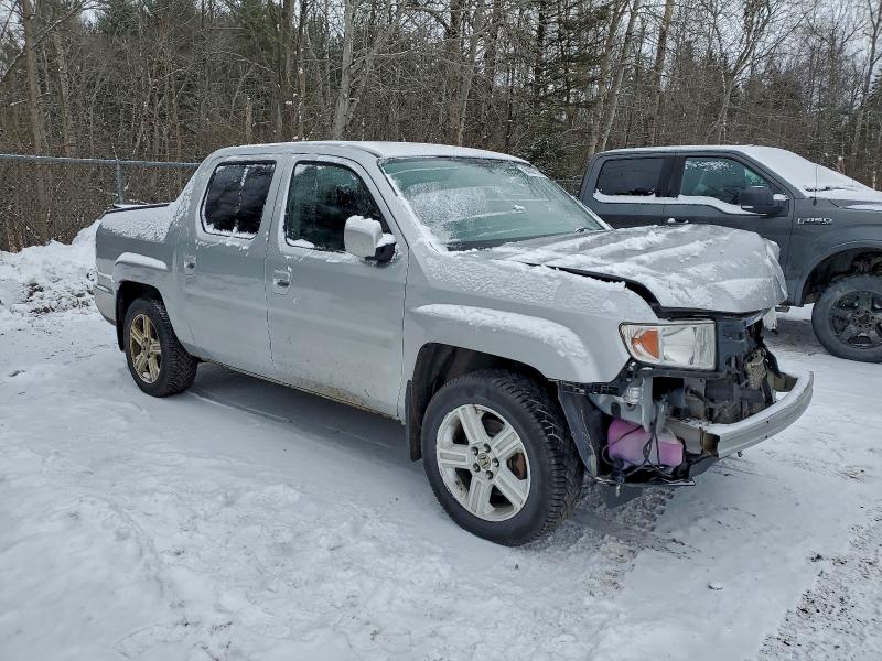 Photo 4 from auction – 2014 HONDA RIDGELINE with VIN 5FPYK1F55EB501150