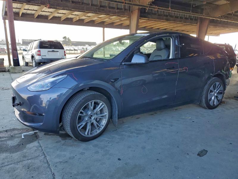 TESLA MODEL Y 2023 with VIN 7SAYGAEE0PF911100 - Photo from auction