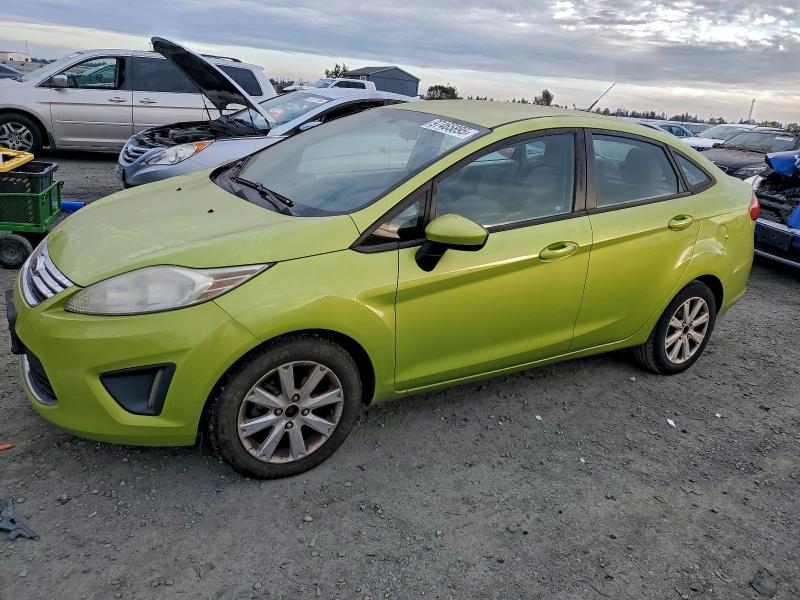 FORD FIESTA 2011 with VIN 3FADP4BJ6BM207704 - Photo from auction