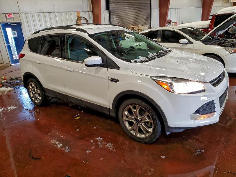 Photo 4 from auction – 2016 FORD ESCAPE SE with VIN 1FMCU9G99GUA96851
