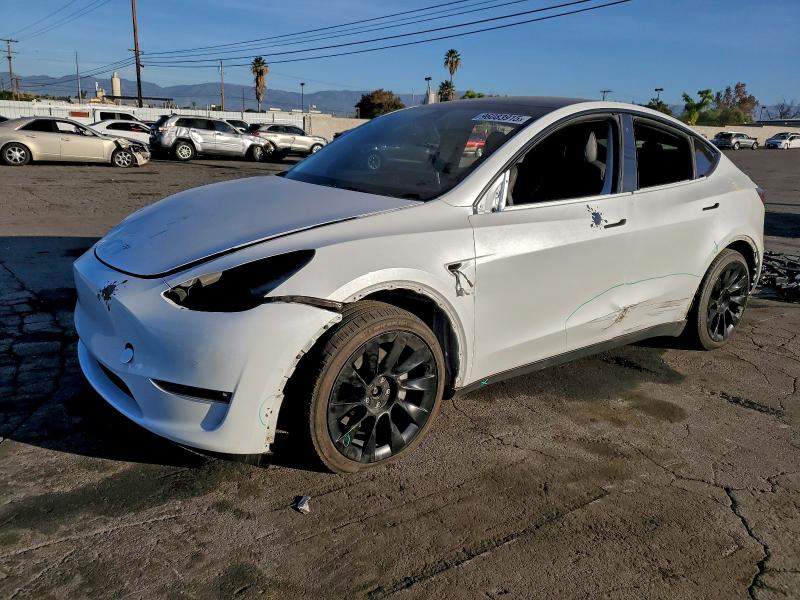 TESLA MODEL Y 2021 with VIN 5YJYGAEE1MF217718 - Photo from auction