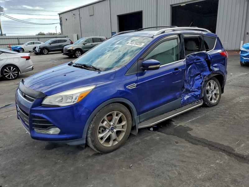 FORD ESCAPE TIT 2014 with VIN 1FMCU0J96EUC98256 - Photo from auction