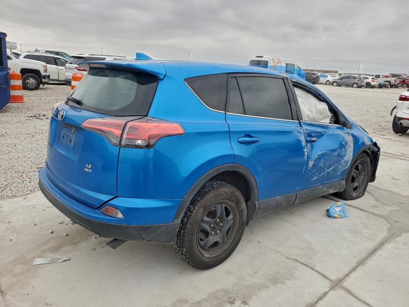 Photo 3 from auction – 2018 TOYOTA RAV4 LE with VIN 2T3BFREV8JW739436
