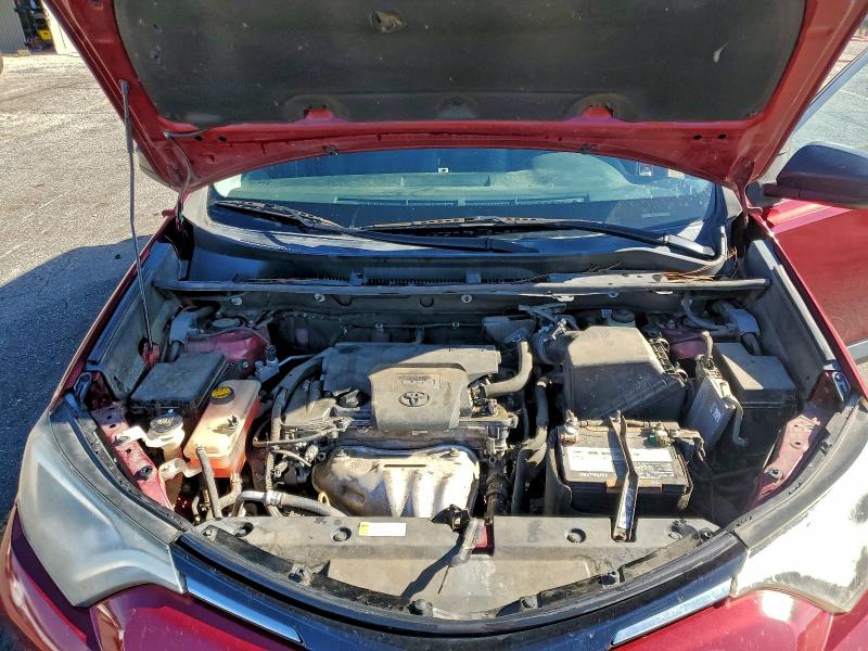 Photo 12 from auction – 2018 TOYOTA RAV4 LE with VIN 2T3ZFREV7JW429325