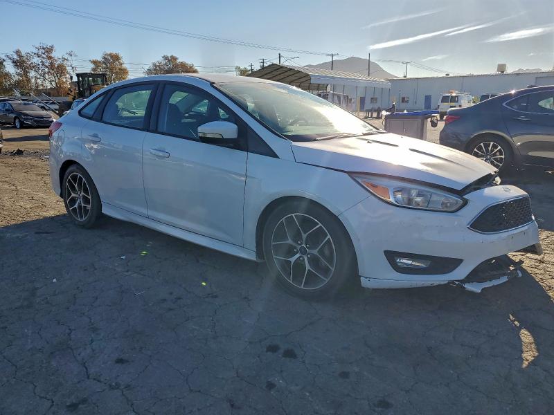 Photo 4 from auction – 2016 FORD FOCUS SE with VIN 1FADP3F24GL238505