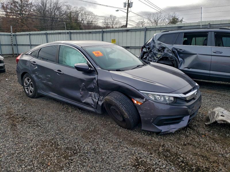 Photo 4 from auction – 2017 HONDA CIVIC LX with VIN 2HGFC2F58HH524585