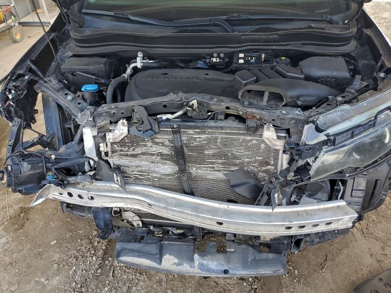 Photo 11 from auction – 2018 HONDA RIDGELINE with VIN 5FPYK2F60JB002300