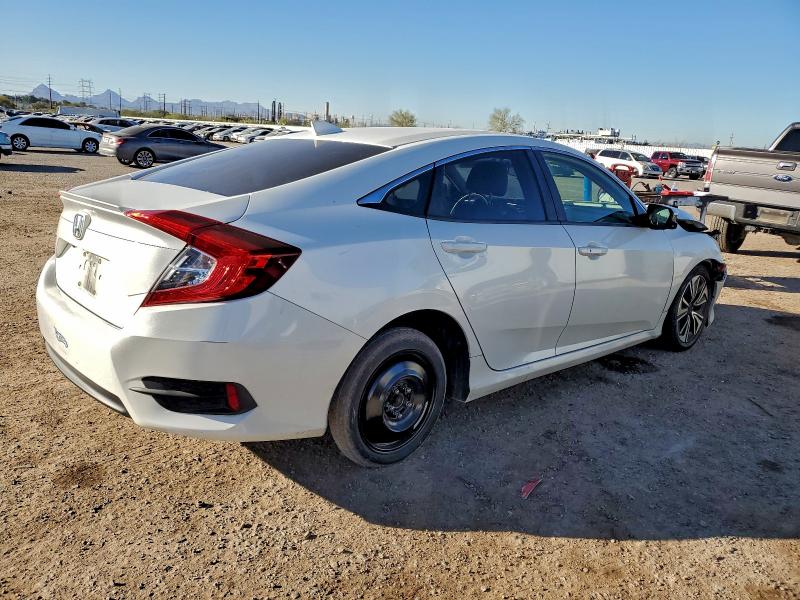 Photo 3 from auction – 2018 HONDA CIVIC with VIN JHMFC1F39JX011434