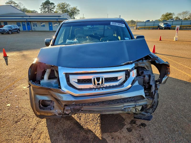 Photo 12 from auction – 2011 HONDA PILOT LX with VIN 5FNYF3H21BB010470