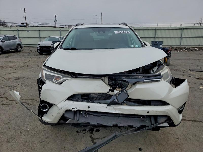 Photo 5 from auction – 2018 TOYOTA RAV4 LIMIT with VIN 2T3DFREV3JW788424