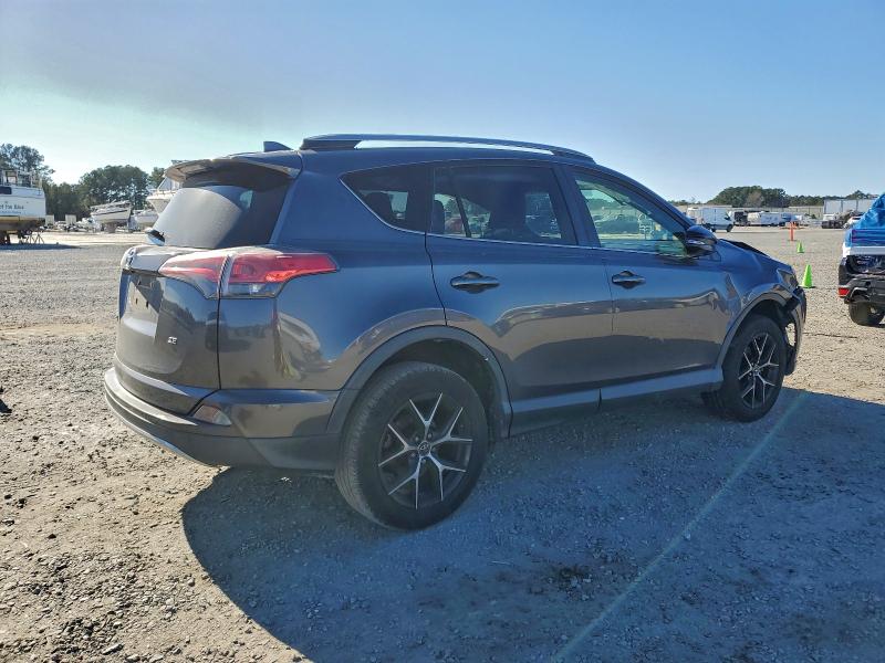 Photo 3 from auction – 2018 TOYOTA RAV4 SE with VIN JTMNFREV4JJ730048