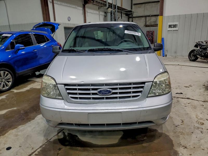 Photo 5 from auction – 2004 FORD FREESTAR S with VIN 2FMZA51674BB16669