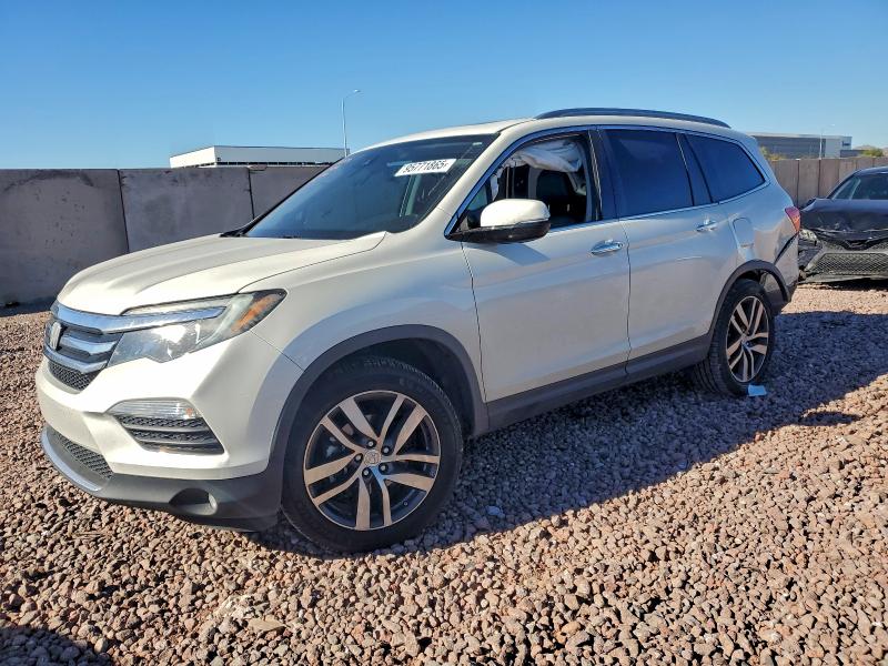 HONDA PILOT ELIT 2018 with VIN 5FNYF6H06JB010639 - Photo from auction