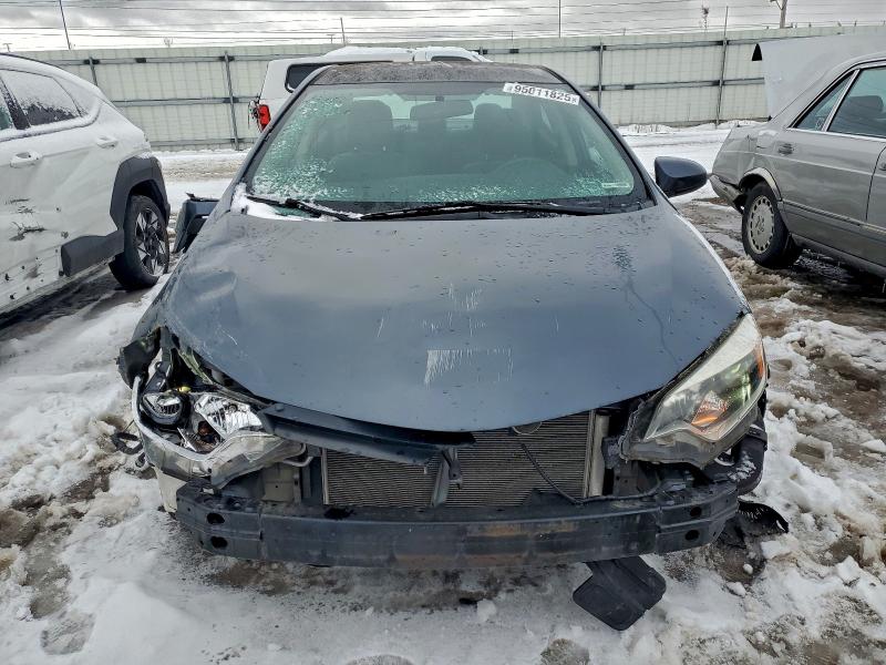 Photo 5 from auction – 2014 TOYOTA COROLLA L with VIN 5YFBURHE2EP133650