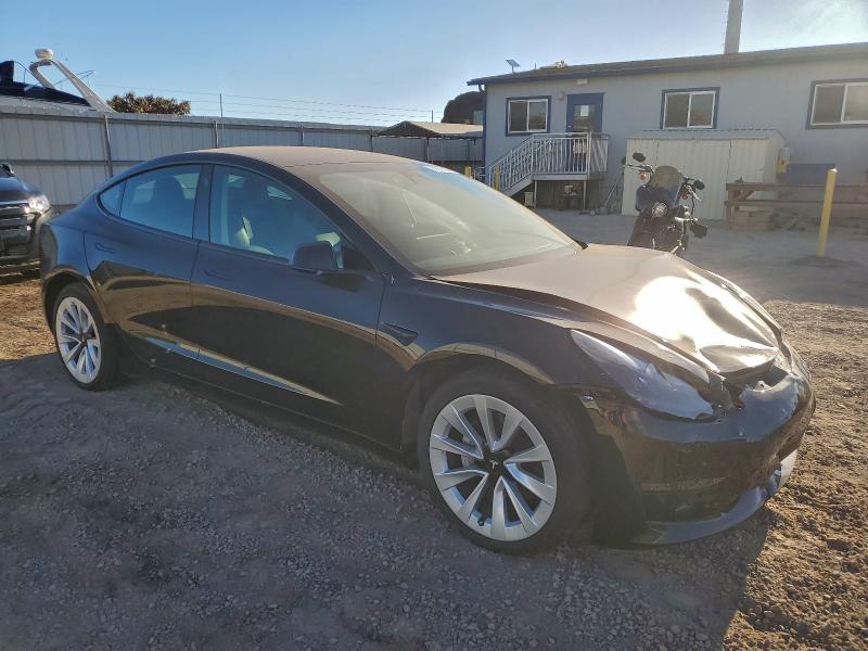 Photo 4 from auction – 2022 TESLA MODEL 3 with VIN 5YJ3E1EA9NF323218