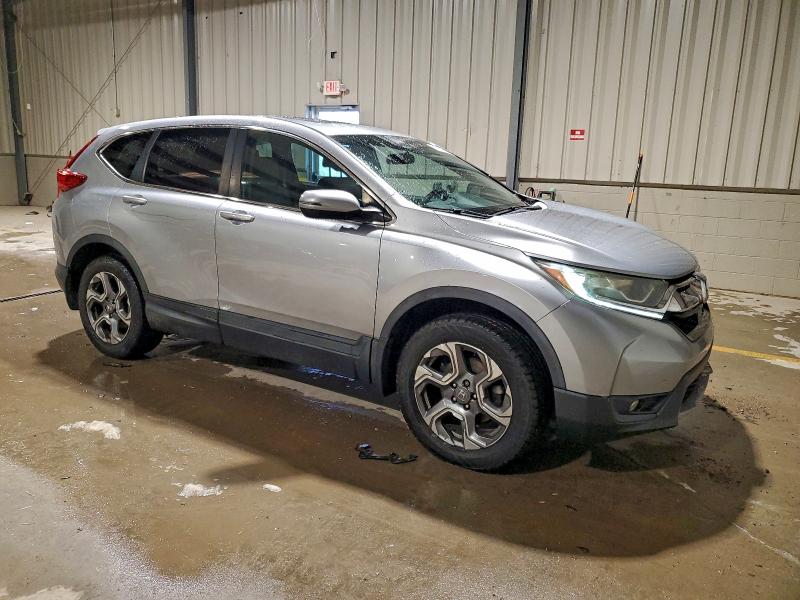 Photo 4 from auction – 2017 HONDA CR-V EX with VIN 2HKRW2H57HH628251
